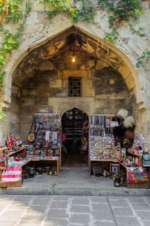 Ancient oriental handmade carpets at Old Town Baku streets. Baku Azerbaijan.の写真素材