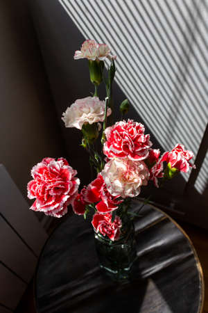 Bunch of flowers in glass vase.の写真素材