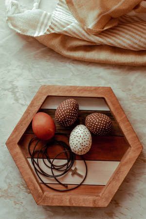 Happy Easter Day With Brown Eggs On The Beige Background