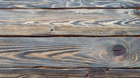 photophone with a dark wood texture of three planks