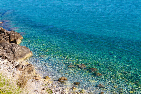 Beautiful idyllic crystal clear turquoise waters shoreline.の写真素材