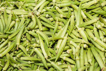 Fresh and nutritious okra vegetable at local fruit marketの写真素材