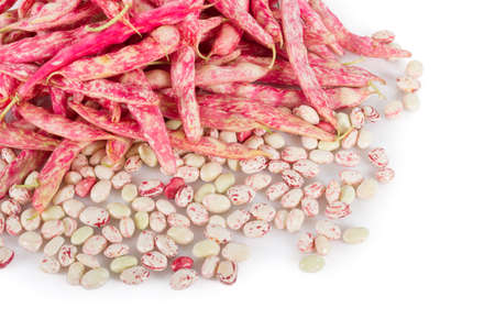 Heap of fresh red beans and bean seeds isolated on white.