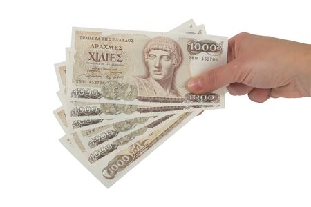 Old Greek currency of 1000 drachmas bills isolated on white.の写真素材