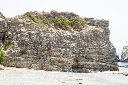 Layered folded rocks formation on southern Crete coast, Greece