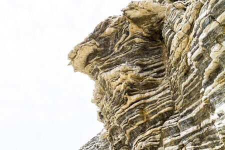 Layered folded rocks formation on southern Crete coast, Greeceの写真素材