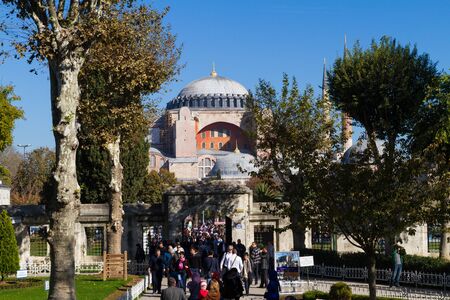 ISTANBUL, TURKEY NOVEMBER 10: Visitors are awaiting to visit Hagia Sophia a former Greek Orthodox church and now a museum on November 10th, 2013 Istanbul, Turkey.のeditorial素材