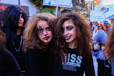 Heraklion, Crete, Greece, March 12, 2016: Participants in colorful costumes marching and dancing in the streets on Mardi Gras carnival festivities in Heraklion Crete, Greeceのeditorial素材