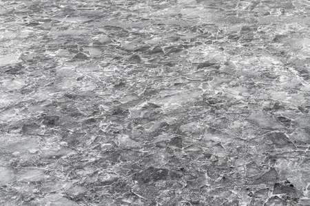 Ice tiles patterns texture background on frozen Spree river in Berlinの写真素材