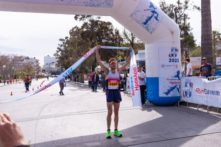 HERAKLION, CRETE, GREECE, APRIL 2, 2023. Zervakis Ioannis Winner runner athlete at the annual Run Greece 10 km urban road race competition in Heraklion Crete Greece.のeditorial素材