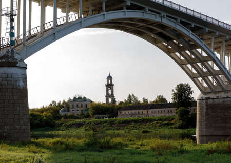 Arch bridge over the Volga River in Staritsa, Russia.On the background of the bell tower.の写真素材