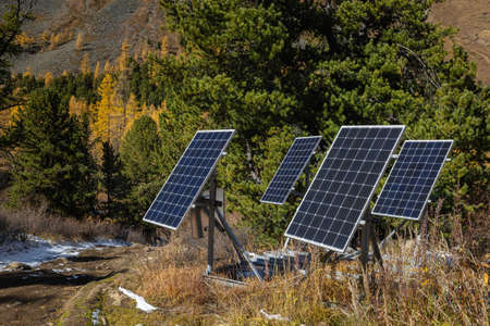 Close-up of modern solar panels in autumn in the mountains. The concept of ecology.