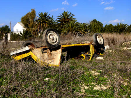 Crashed car on a countrysideの写真素材