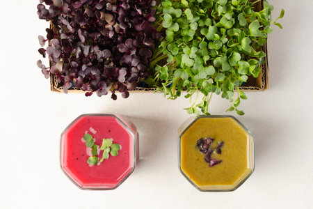 Different types of microgreens smoothie as a snack for healthy eating. Close up, top view, copy space for text. High quality photoの写真素材