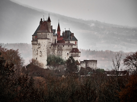 Shot of the Chateau Menthon Saint Bernard, a historical castle near Annecy in autumn. They say its the castle which inspired the Disneyland's oneのeditorial素材