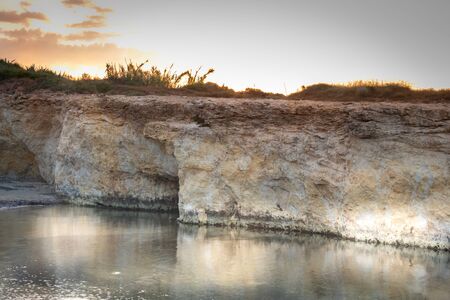 Shot of the Cirica Bay at sunrise. Cirica is a beautiful natual seaside place made of cliffs, rocks...