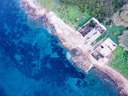 Wondeful aerial view at sunset of the island in front of Portopalo, a town in the south of Sicily. The shot is taken during a beautiful sunny dayの写真素材