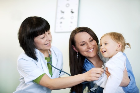 Doctor examining childの写真素材