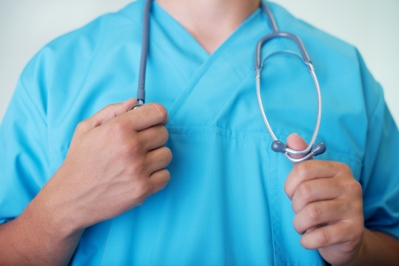 Doctor holding stethoscopeの写真素材