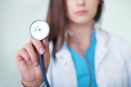 Doctor holding stethoscopeの写真素材