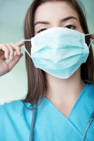 Young doctor wearing a maskの写真素材