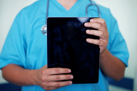 Doctor holding digital tabletの写真素材