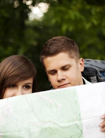 Couple looking at mapの写真素材