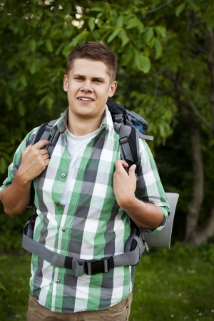 Man walking through forestの写真素材