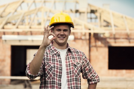 Construction worker showing ok signの写真素材