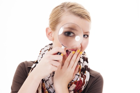 Woman with magnifying glassの写真素材