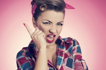 Angry sexy retro woman shaking her fingerの写真素材