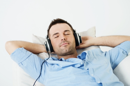 Dreaming man listening to musicの写真素材