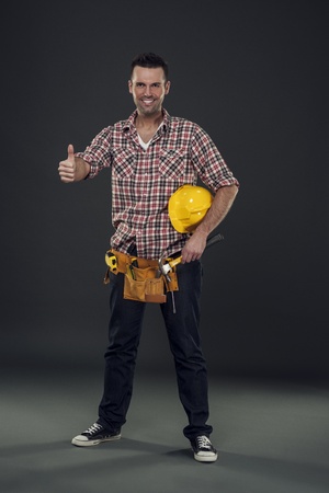 Construction worker showing thumbs upの写真素材
