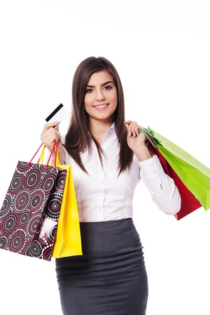 Businesswoman with shopping bag and credit cardの写真素材