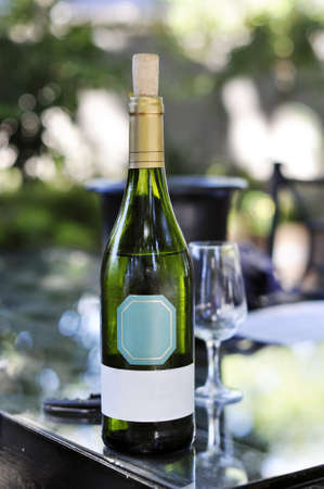 White wine bottle on tableの写真素材