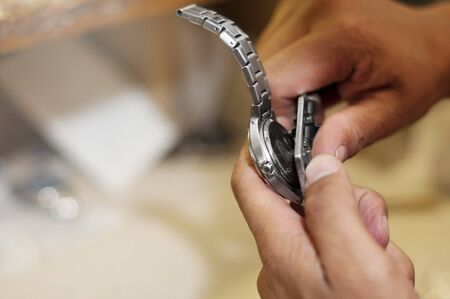 Watch maker at work  Copy spaceの写真素材