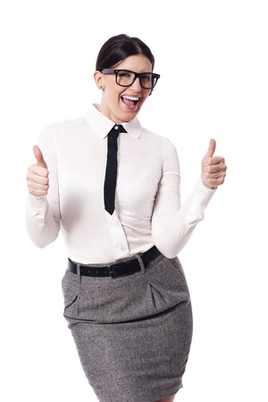 Businesswoman gesturing thumbs upの写真素材
