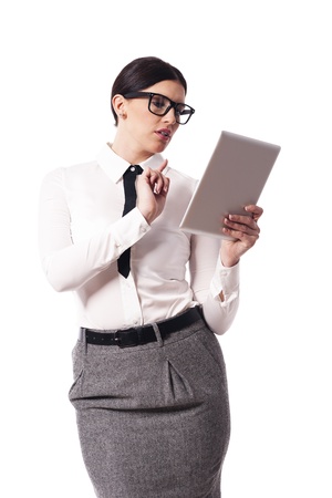Beautiful businesswoman using digital tabletの写真素材