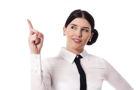 Businesswoman pointing to copy spaceの写真素材