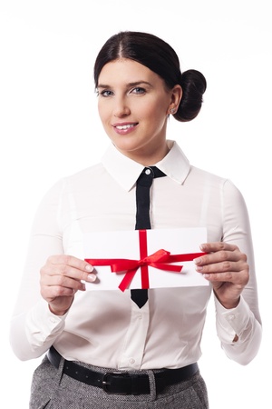 Smiling woman giving a business cardの写真素材