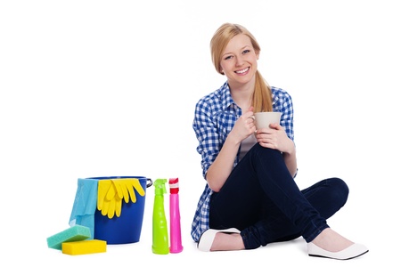Young woman relaxing after cleaningの写真素材
