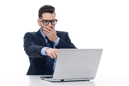 Surprised young businessmanの写真素材