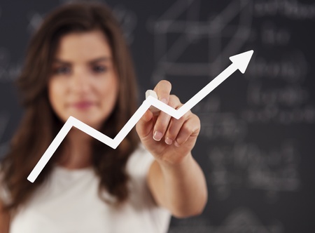 Woman drawing graph の写真素材