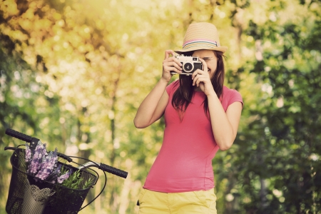 Retro photographer using old camera の写真素材