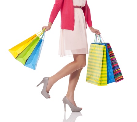 Carrying shopping bags, low sectionの写真素材
