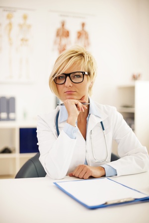 Portrait of beautiful blonde female doctor の写真素材