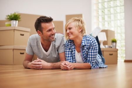 Couple taking a break from moving houseの写真素材