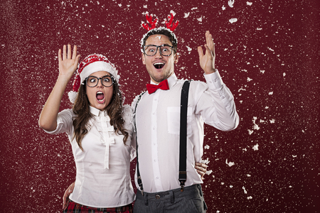 Nerd couple are shocked from first snow の写真素材