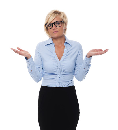 Blonde and beautiful businesswoman shrugging の写真素材