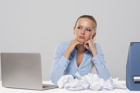 Portrait of boring blonde businesswoman の写真素材